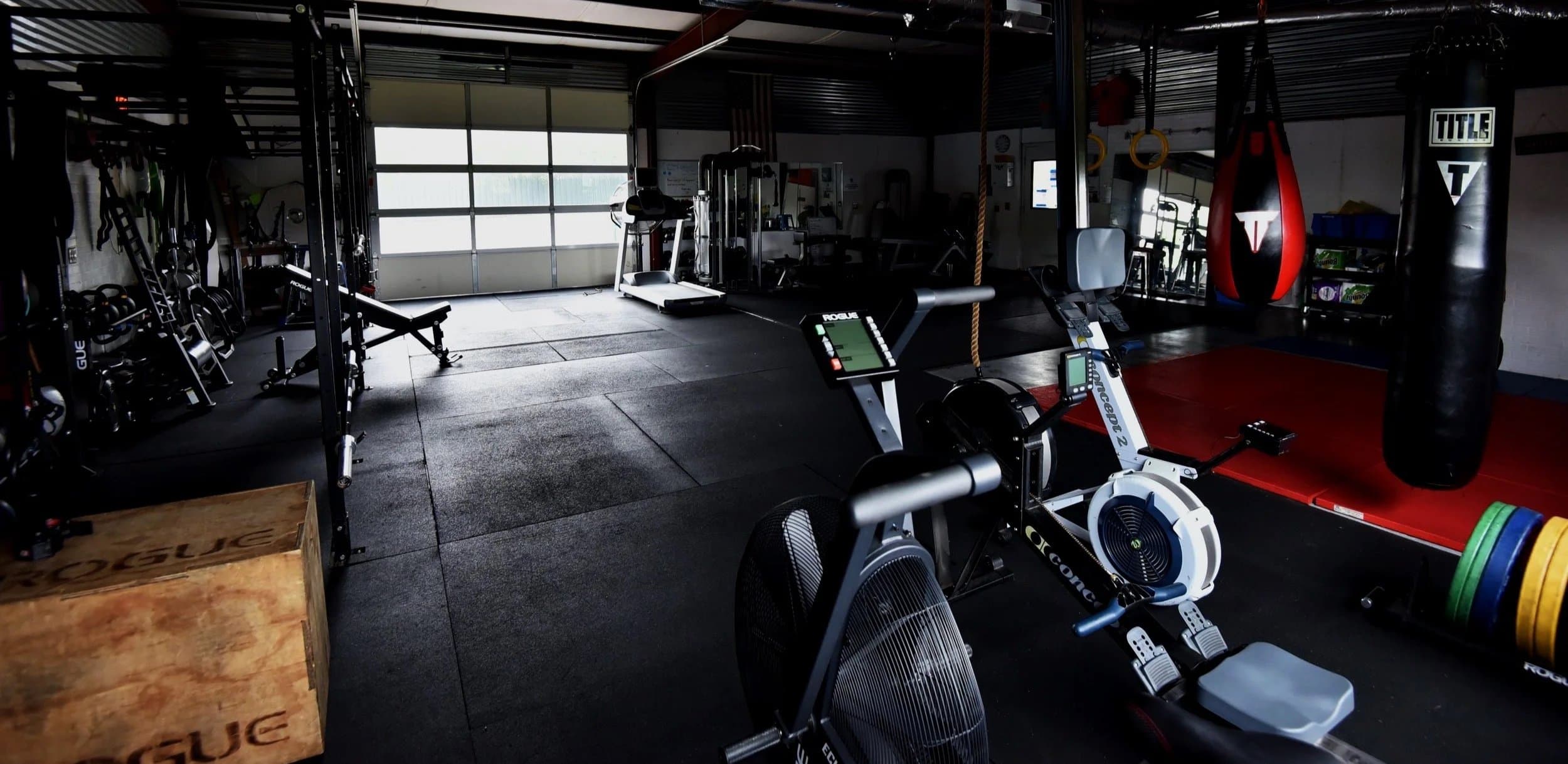 Private personal trainer coaching a client at Tiger ATX Training gym in Southwest Austin with dedicated strength equipment and no commercial gym crowds